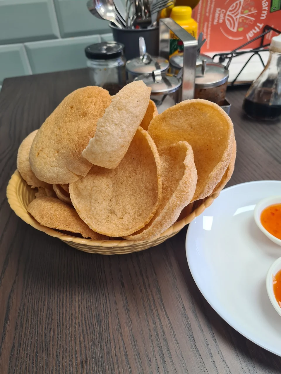 Prawn crackers in a basket at Charm Thai Cafe Doncaster